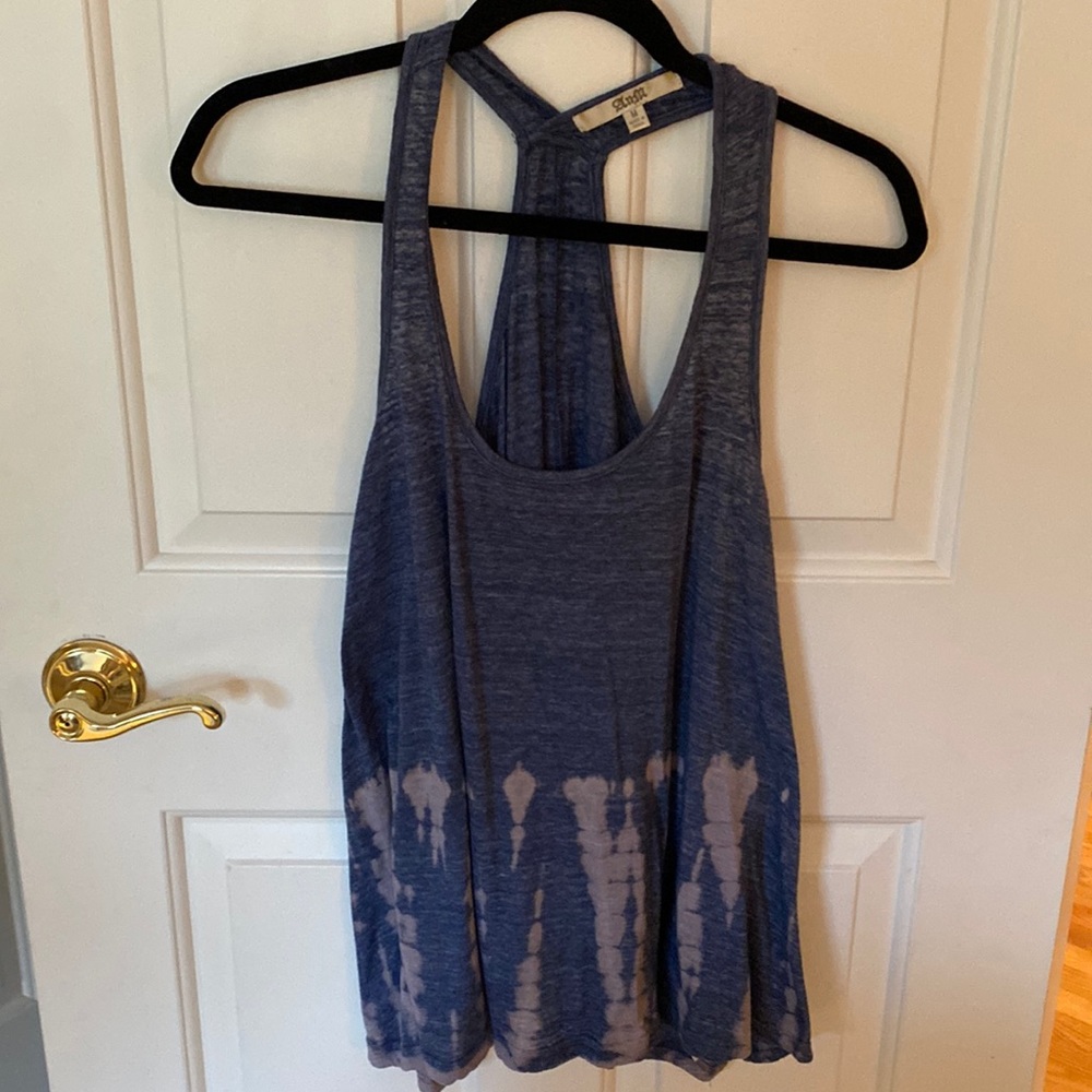 T Back tank with tie dye detail on bottom.